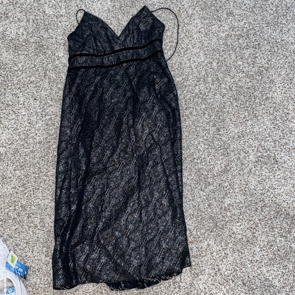 Black and silver med length dress